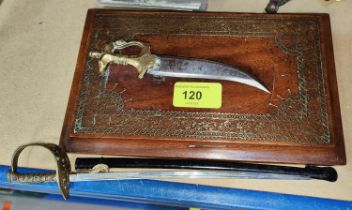 An Indian ornamental dagger letter holder on gilded stand and a letter opener sword in sheath