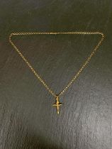 A yellow metal crucifix pendant, stamped 375, on 9 carat hallmarked gold chain, 4.4gm