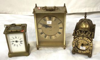 A 20th century brass carriage clock; a reproduction brass carriage clock; a period style brass