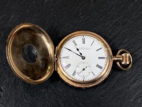 An Edwardian keyless half hunter pocket watch by AWW Waltham with extensively chased case.