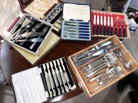 A good selection of boxed cutlery sets etc