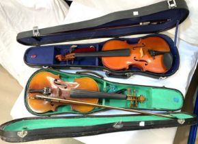 A 20th century students two piece backed violin in hard carry case with bow, full size; A 20th