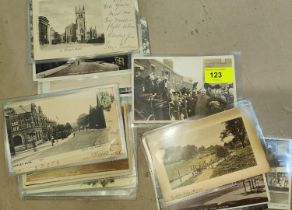 A small collection of vintage, early 20th century postcards with local scenes