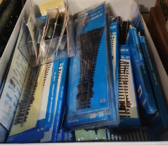A good selection of Peco and Hornby 00 gauge track, some packaged and loose