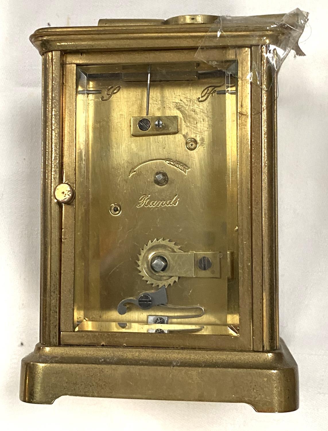 A 20th century brass carriage clock; a reproduction brass carriage clock; a period style brass - Image 6 of 6