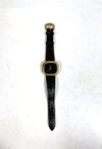 A gent's yellow metal dress wristwatch by Beuche-Girod, stamped 375, with black dial and strap