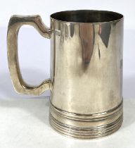 A hallmarked silver 1 pint mug of tapering cylindrical form, Sheffield 1933, 9oz