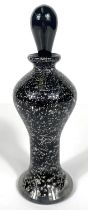 A black glass perfume bottle with silver foil inclusions, 18cm