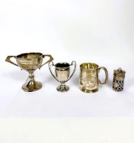 Four hallmarked silver items:  a 2-handled trophy cup; a christening mug; a small trophy cup; a