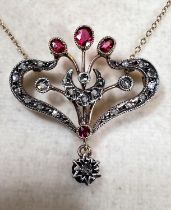 A Victorian yellow metal pendant necklace 16", set with rose cut diamonds and garnets, chain stamped