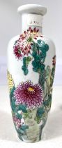 A Chinese Liuyeping vase decorated in polychrome of lush floral scene with inscriptions to reverse