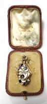 An unusual 19th century Russian locket pendant, the diamond shaped, rose gold case is set with multi