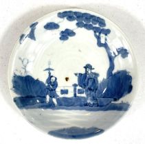 A Chinese blue and white dish with figures and trees, seal mark to base, di. 18.5cm