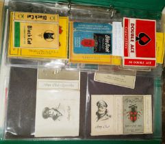 an album of vintage cigarette card packs.