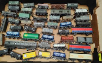 Forty seven carriages/cars/trucks, etc., some with advertising decals, 00 gauge