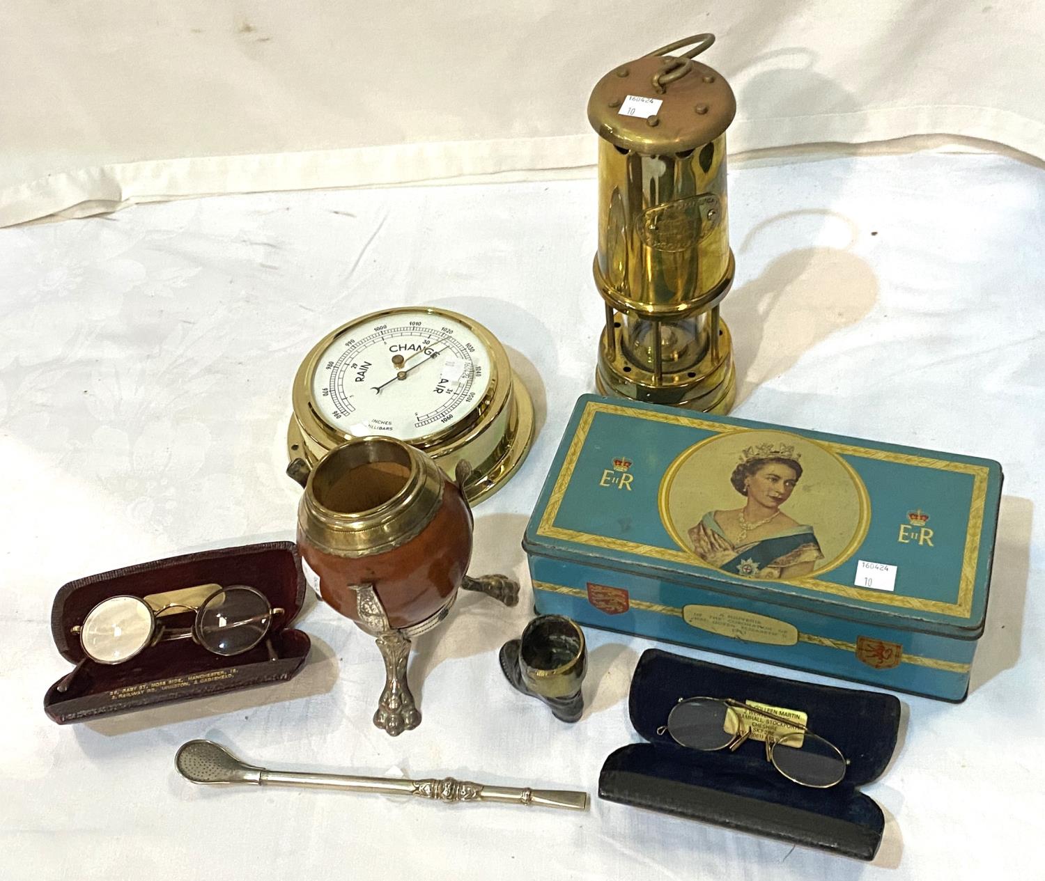 A miner's lamp; a barometer; 2 pairs of gold rim glasses; etc.