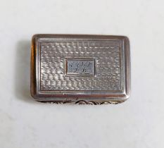 A hallmarked silver vinaigrette by Taylor & Perry with engine turned decoration, monogrammed,