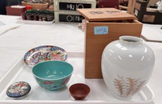 A Chinese turquoise ground rice bowl with floral painted decoration to exterior, plain interior,