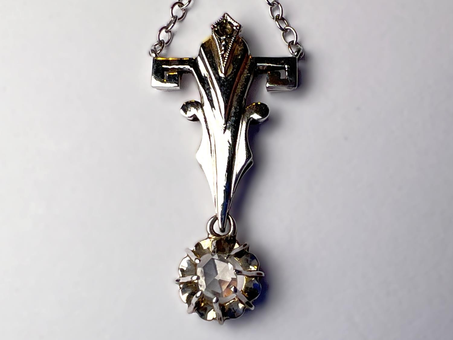 An Art Deco cruciform style white metal pendant with diamond drop, tests as 9ct, on fine chain - Image 2 of 8