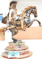 A silvered and gilded sculpture:  Cavalier on horseback, bears plate 345/500, height 21cm; a Royal