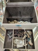 A selection of costume jewellery including pearls etc