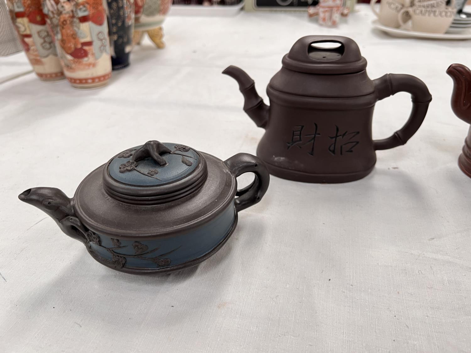A Yixing teapot, no lid, impressed mark to base, height 10cm; a similar squat teapot with lid; - Image 2 of 4