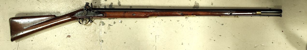 A late 18th/early 19th century flint lock musket, stamped ARCHER, mahogany stock with brass