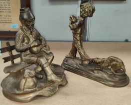 A pair of brass figures