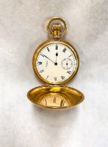 A keyless gold plated hunter pocket watch by Waltham USA (ticks for a few seconds only)