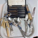 A boxed set of tea knives and loose cutlery