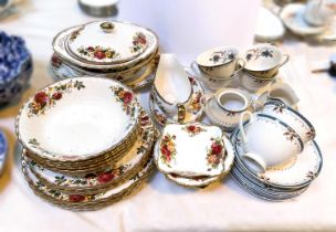 A part dinner service of 22 pieces approx.:  Old Country Roses/English Rose;18 pieces of Royal