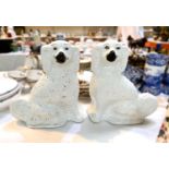 A 19th century pair of Staffordshire King Charles spaniels