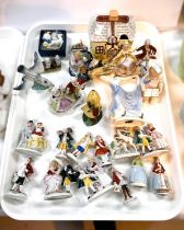 A collection of continental miniature porcelain figures of children