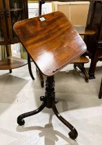 A 19th century mahogany adjustable reading/lecture table, on tripod base with scroll supports (1