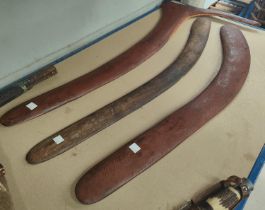 Two large Aboriginal type boomerangs and a similar wooden weapon