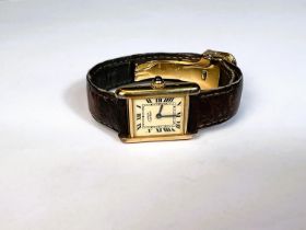 Cartier: a silver gilt Tank dress watch square dial Roman numerals, stamped 925 on leather strap