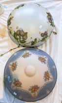 An early 20th century light bowl with etched floral decoration with blue border and another