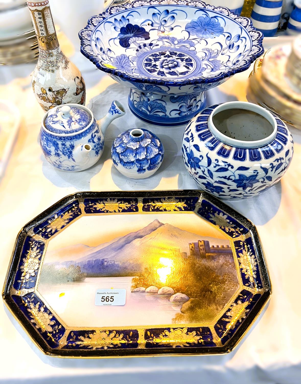 A Noritake dressing table tray decorated with a landscape scene; a modern oriental large dish on