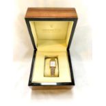 A Dreyfuss & Co. gold plated and stainless steel ladies watch in original box.