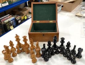 A carved Staunton style wooden chess set with weighted bases in walnut box, height of king 3.25"