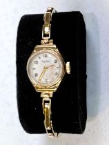 A ladies Rotary wristwatch on a 9 carat gold expanding strap (gross weight 11.9 gms.)