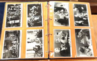 Two albums of postcards relating to 20th century film stars:  Film Weekly & Film Shots, 163 approx.