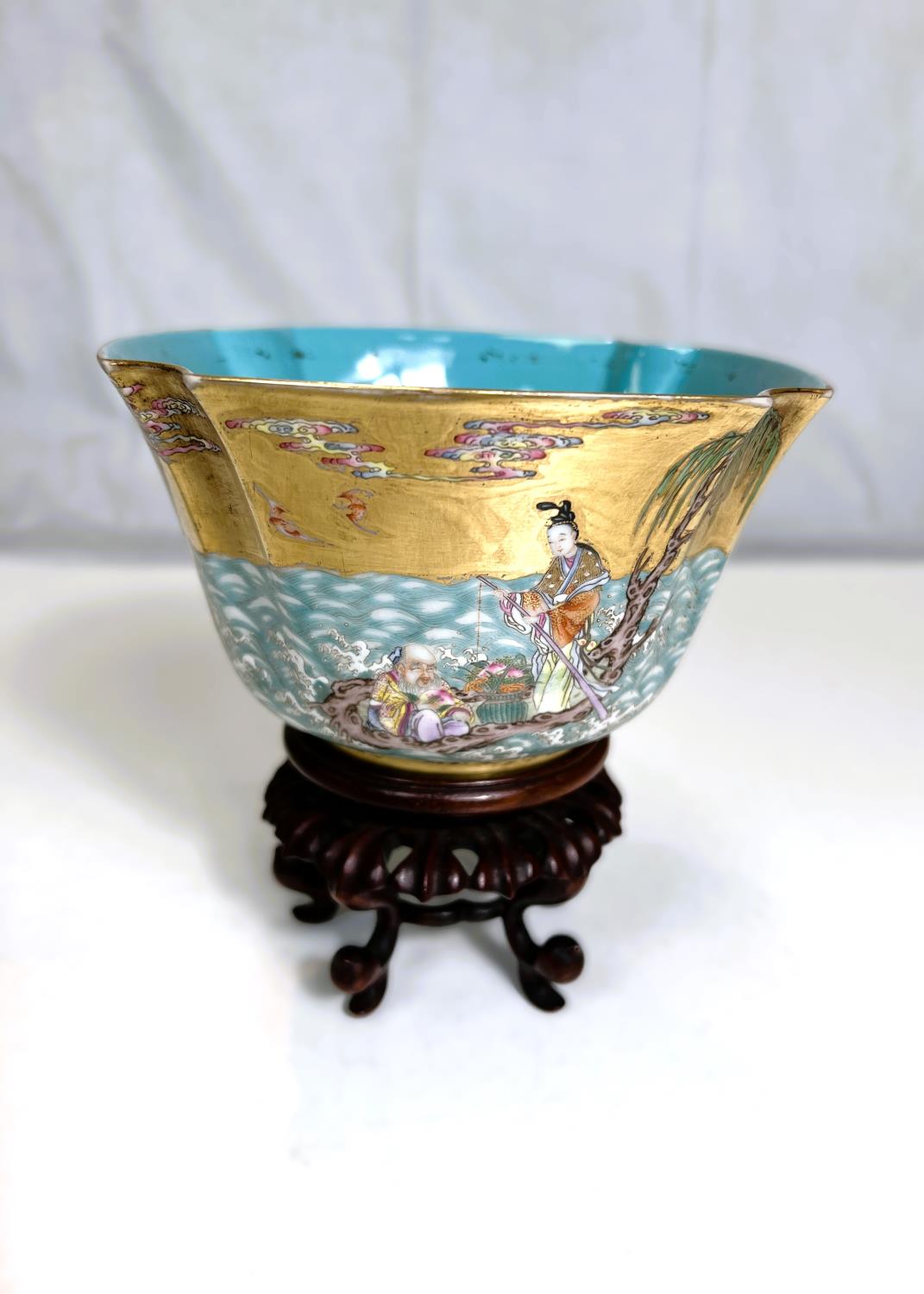 A Chinese shaped square bowl with polychrome enamel decoration of deities on islands and choppy