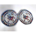 A Chinese porcelain pair of octagonal dishes with floral border and vases; etc., to the centre (1