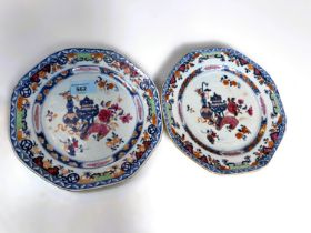 A Chinese porcelain pair of octagonal dishes with floral border and vases; etc., to the centre (1