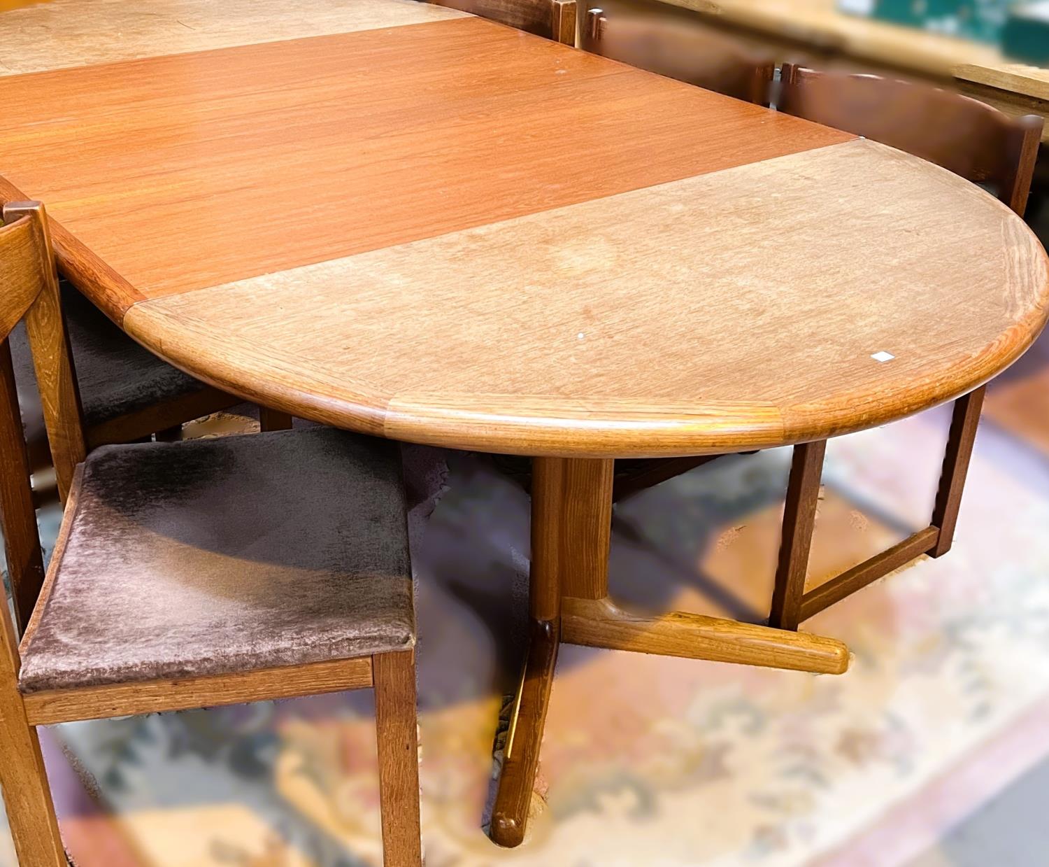 A large 1970's G-Plan oval teak extending dining table, 2 spare leaves, extended length 234cm - Image 2 of 4