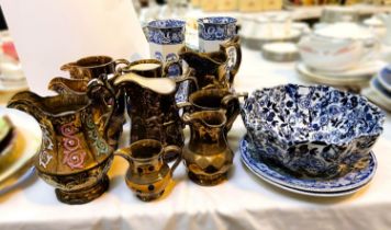 Nine 19th century copper lustre jugs; a Royal Cauldon pair of hexagonal vases; blue & white pottery