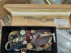 A 9ct gold backed Accurist watch 3.7gms, a cased Gucci watch and a selection of other watches