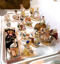 A collection of continental miniature porcelain figures of children