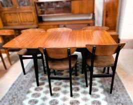A 1950's / 60's Nathan sapele mahogany dining suite on ebonised legs comprising rectangular